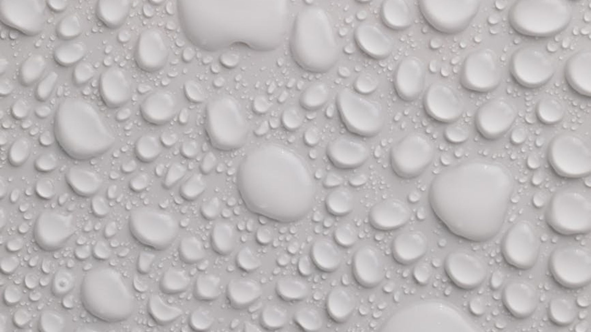 Abstract light grey background suggesting clarity and space.